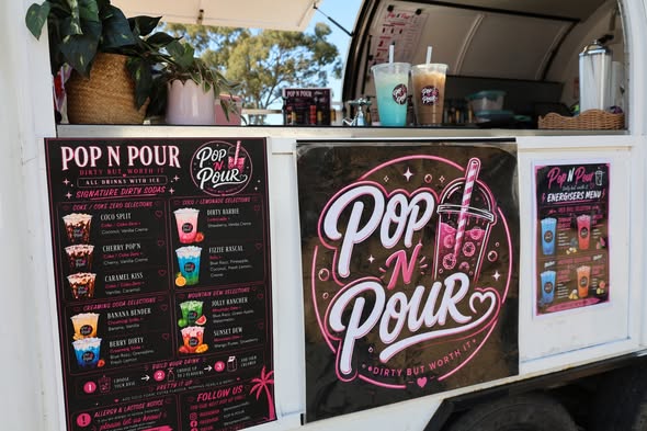 The Pop N Pour mobile van with its colourful menu and drinks